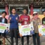 Ketua DPRD Provinsi Jambi M. Hafiz Fattah foto bersama pemenang lomba Jambi City Run